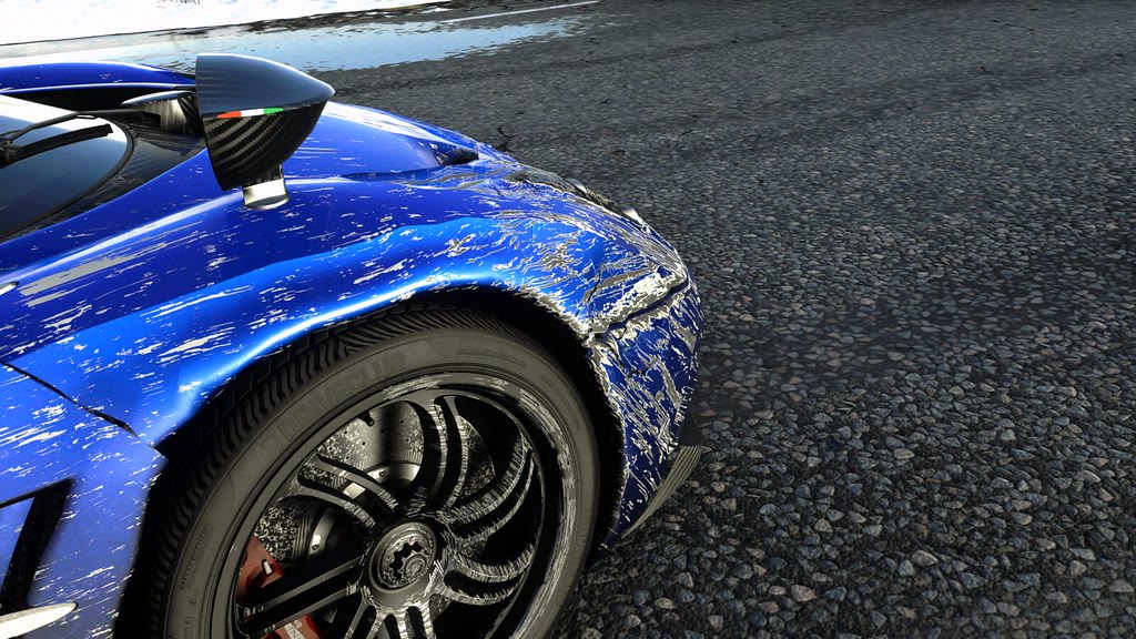 Un’auto danneggiata nel materiale ufficiale della versione PS4 di DriveClub, dalla gallery PlayStation.Blog.