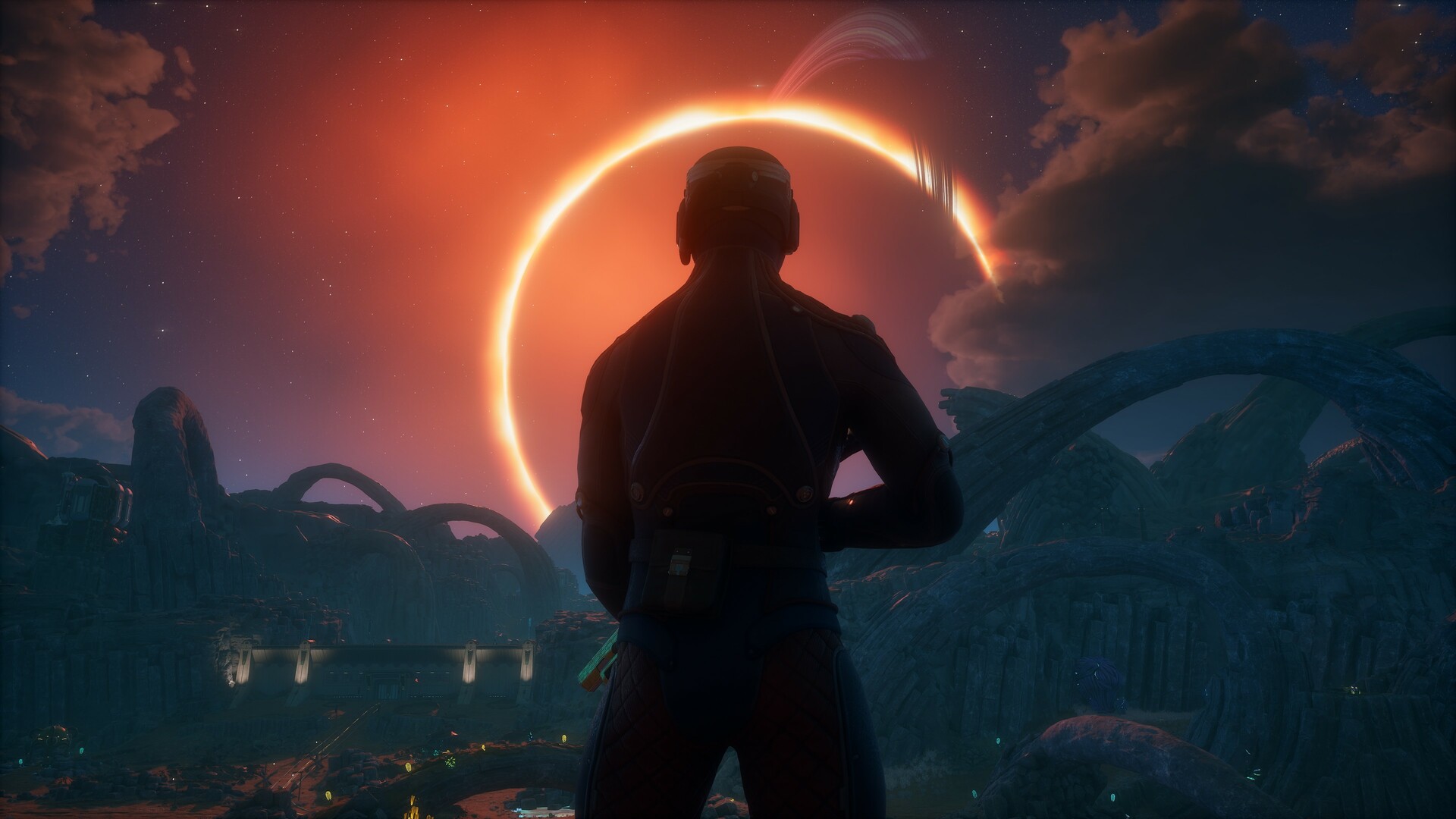 Un personaggio osserva un’eclissi in un paesaggio alieno — The Outer Worlds 2.